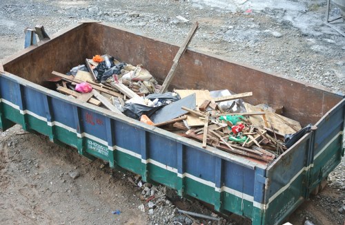 Trash collection team handling waste removal in a London street