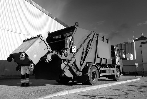 Litter clearance team working in a London street with bagged waste and tidy pavement