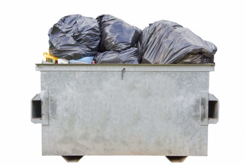 Rubbish clearance team working in a London residential street
