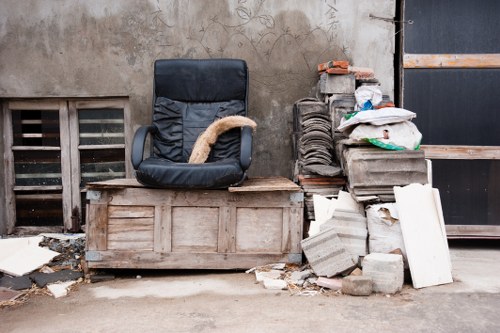Waste removal team handling collection paperwork and materials