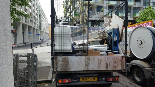 Careful sorting of furniture and personal items during probate clearance